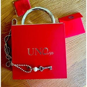 UNO de 50 long necklace with pearl and key pendant